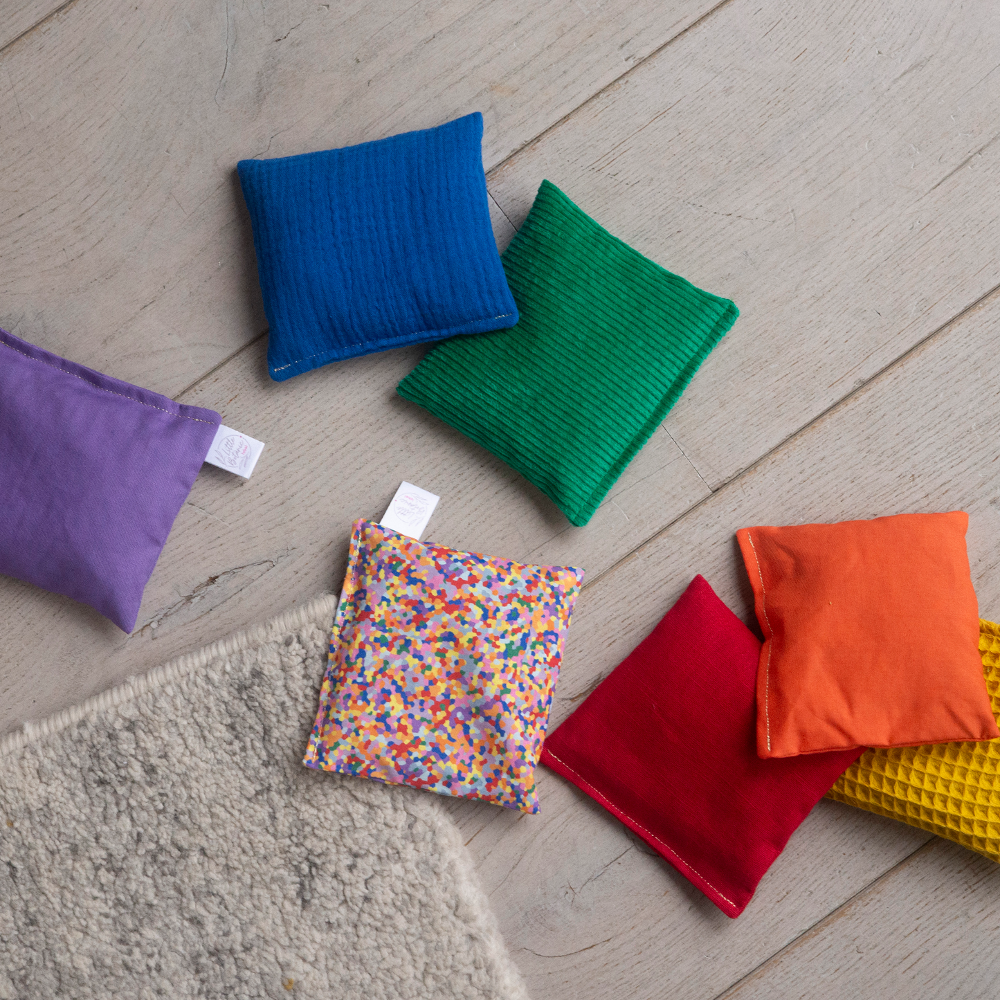 Sensorische pittenzakjes - Regenboog + super confetti- 7 stuks