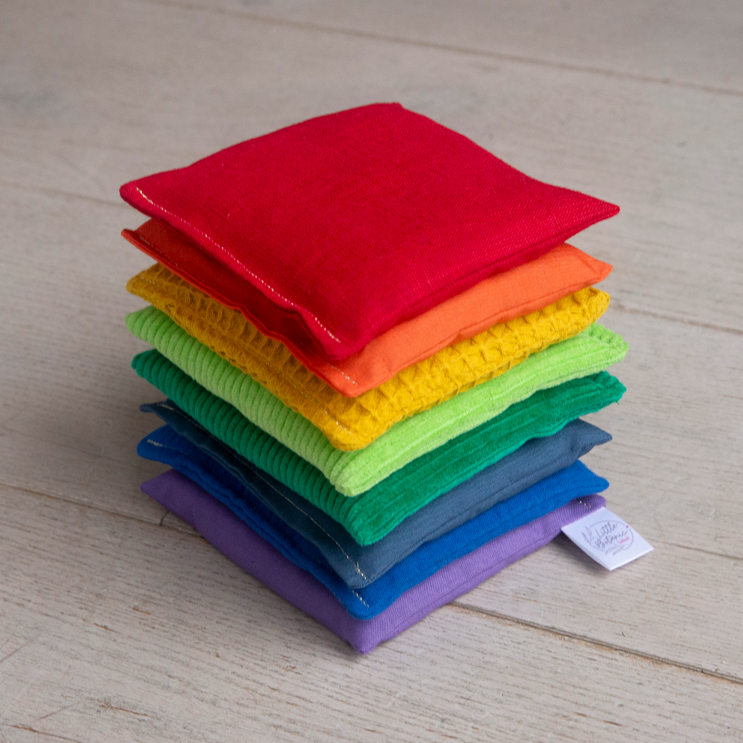 Sensorische pittenzakjes - Regenboog 8-delig