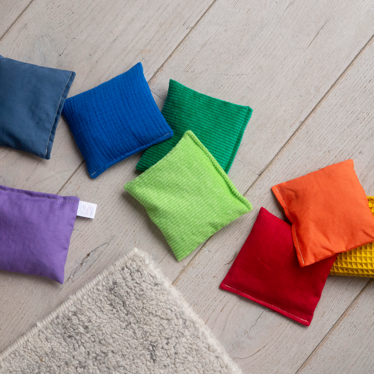 Sensorische pittenzakjes - Regenboog 8-delig