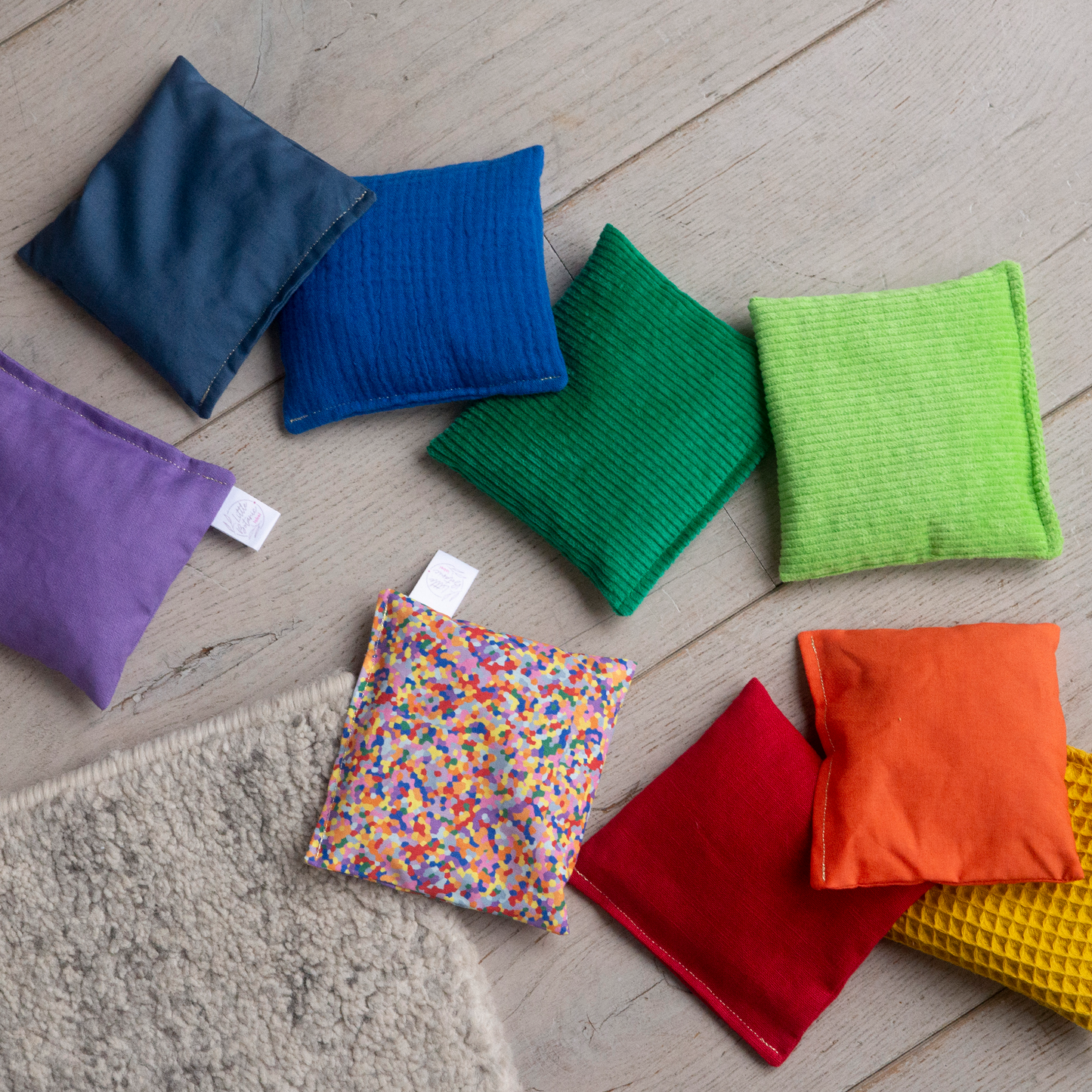 Sensorische pittenzakjes - Regenboog 8-delig + super confetti