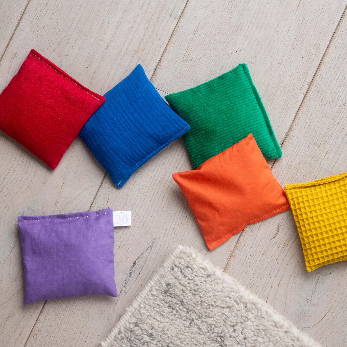 Sensorische pittenzakjes - Regenboog + waves - 7 stuks