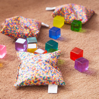 Sensorische pittenzakjes - pastel + pastel confetti - 7 stuks