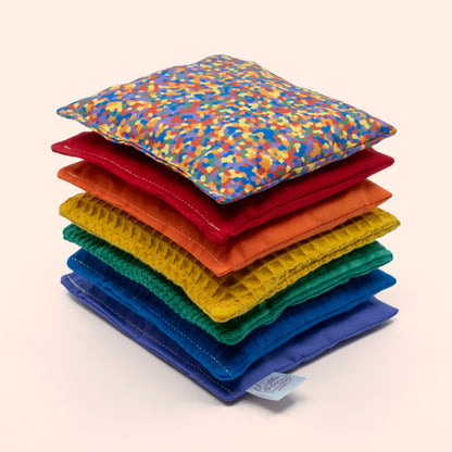 Sensorische pittenzakjes - Regenboog + regenboog confetti - 7 stuks