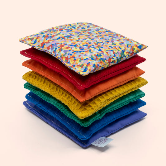 Sensorische pittenzakjes - Regenboog + super confetti- 7 stuks